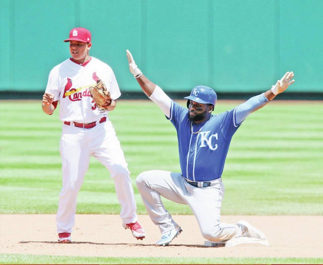 Kansas City Royals’ Abraham Almonte reacts as he reaches second safely on a single and an error in the sixth inning during a game between the St. Louis Cardinals and the Kansas City Royals at Busch Stadium on Wednesday, in St. Louis, Mo. At left is Cardinals shortstop Yairo Munoz. The Royals won, 5-2. Chris Lee/St. Louis Post-Dispatch/TNS