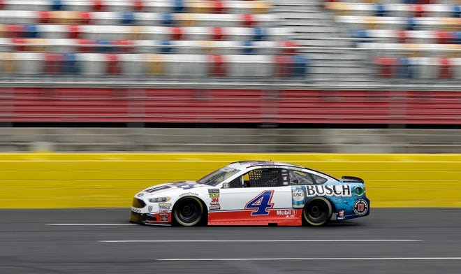 Kevin Harvick (4) drives his car during practice for the NASCAR Cup series auto race at Charlotte Motor Speedway in Charlotte, N.C., Thursday, May 24, 2018. (AP Photo/Chuck Burton)