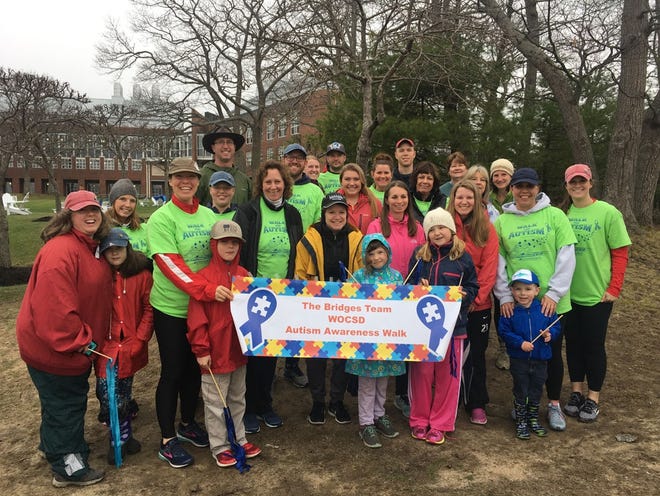 The 2018 WJHS Bridges Team at the University of New England on April 29. Team members in green shirts are staff from Wells Junior High School. Team captain Heather McAtavey is at the far right behind the front row. Most of the other walkers in the photo are staff family members (some WJHS students), friends and other community members.

[Courtesy photo]