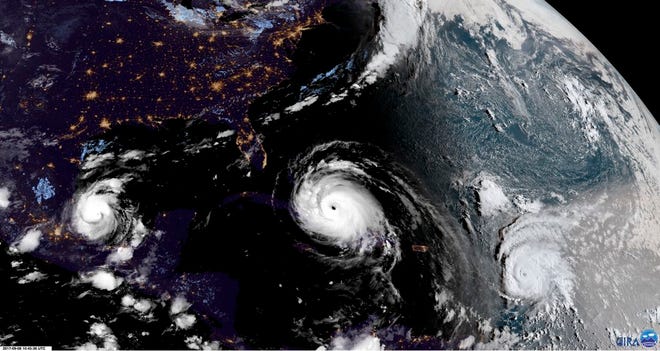 In this geocolor image GOES-16 satellite image taken Friday, Sep. 8, 2017, Hurricane Irma, center, approaches Cuba and Florida, with Hurricane Katia, left, in the Gulf of Mexico, and Hurricane Jose, right, in the Atlantic Ocean. [NOAA via AP]