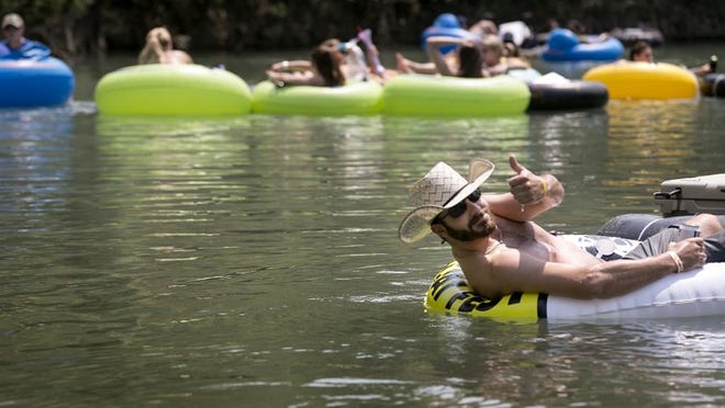 Tubers float the San Marcos River. LAURA SKELDING / AMERICAN-STATESMAN 2015 file