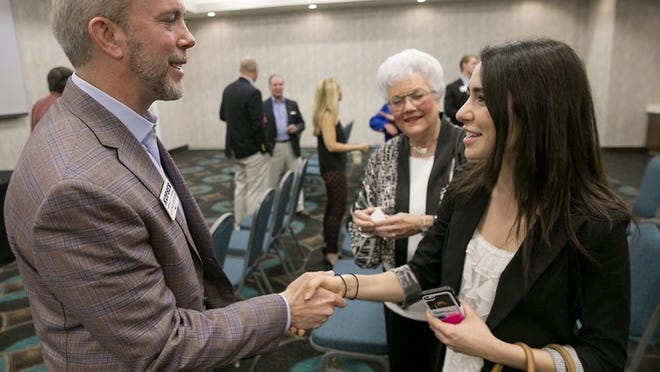 Joseph Kopser participates in a Democratic candidate forum in San Marcos in the 21 Congressional District on May 2. He greets Texas State University student Joyana Richer with KTSW campus radio after the forum. RALPH BARRERA / AMERICAN-STATESMAN