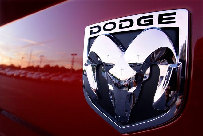 This Aug. 15, 2010 file photo shows a Dodge Ram logo at a dealership in Springfield, Ill. Fiat Chrysler is recalling 4.8 million vehicles in the U.S. because in rare but terrifying circumstances, drivers may not be able to turn off the cruise control. Affected models include the 2014-2019 Ram 1500 pickup, as well as the 2014-2018 Ram 2500, 3500, 4500 and 5500 pickups and chassis cab trucks. (AP Photo/Seth Perlman, File)