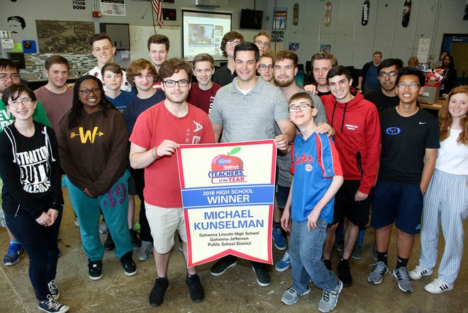 Michael Kunselman (center) is surrounded by some of his students in the FabLab at Gahanna Lincoln High School. Kunselman, an engineering teacher, was the high school winner in the 2018 Columbus Parent/ThisWeek Community News Teachers of the Year awards. An award presentation was held May 2, 2018, at the school.