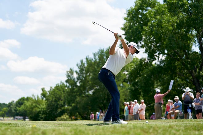 Justin Rose tees off on the ninth hole during the final round of the Fort Worth Invitational golf tournament at Colonial Country Club. [Cooper Neill/The Associated Press]