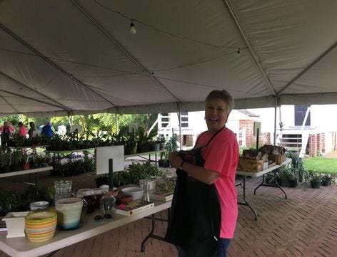 Wonder City Garden Club member, Laura Smith, prepares for the club's plant sale. [Contributed Photo]