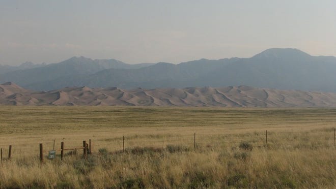 The Great Sand Dunes and the Sangre de Cristo Mountains in southern Colorado, shown in this 2007 photo, are near the government-owned property where Interior Secretary Ryan Zinke wants to allow fracking. Allen Holder/Kansas City Star/MCT