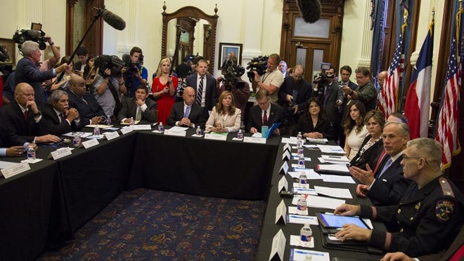 Gov. Greg Abbott hosted a roundtable discussion about school safety at the state Capitol on May 22 after the recent school shooting in Sante Fe. Round Rock Police Chief Allen Banks participated in the roundtable. ANA RAMIREZ / AMERICAN-STATESMAN