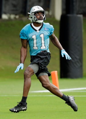 Carolina Panthers receiver Torrey Smith runs a drill during practice on Tuesday in Charlotte, N.C. [Chuck Burton/The Associated Press]