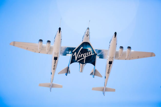 Virgin Spaceship Unity and Virgin Mothership Eve take to the skies on its first captive carry flight Sept. 8, 2016. [Courtesy of Virgin Galactic]