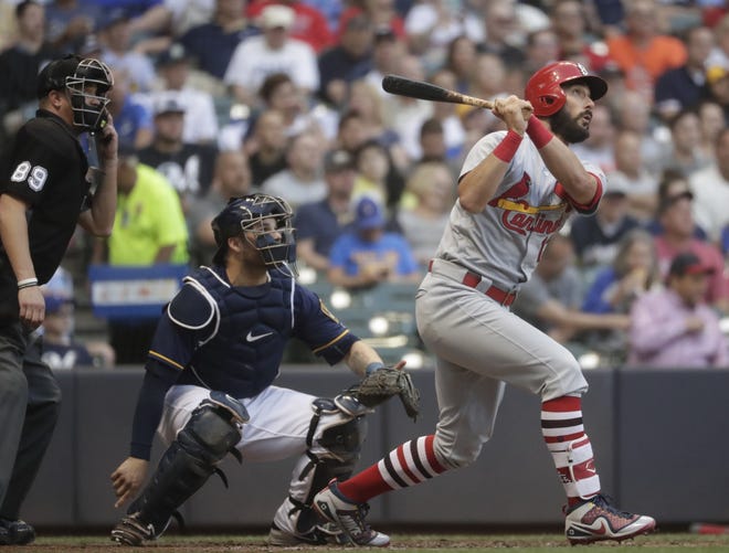 St. Louis Cardinals' Matt Carpenter hits a home run during the fourth inning against the Milwaukee Brewers on Tuesday. [Morry Gash/The Associated Press]