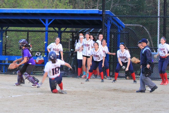 Lincoln-Sudbury’s Rachel Pellegrino scoring on a game-winning, walk-off double by Jessie Venis against Boston Latin that launched a seven-game winning streak. [Courtesy Photo]