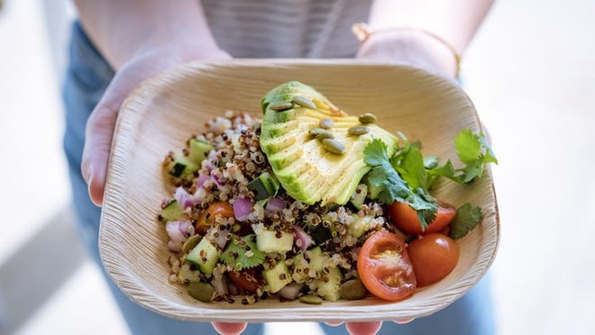 A quinoa salad filled with produce from your garden and tangy ingredients from your fridge makes for a refreshing summer meal. Contributed by NLand Surf Park.