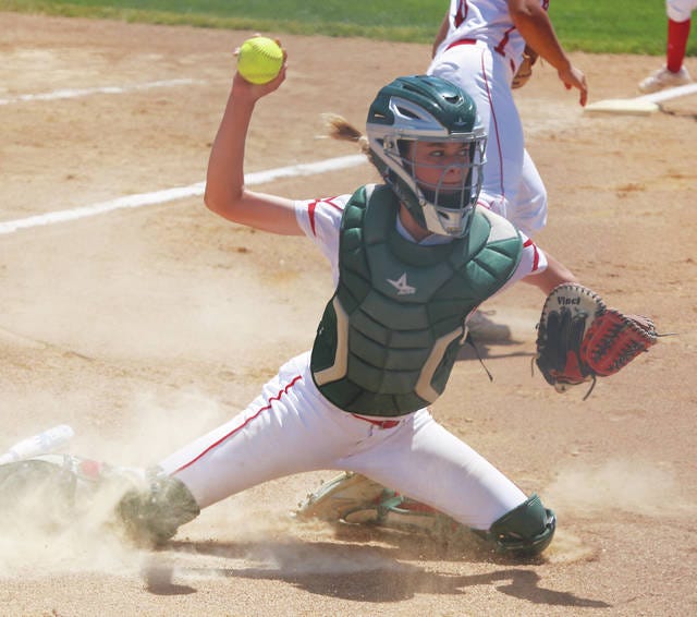 Boone’s freshman catcher, Zoey Hightshoe, gathers a bunted ball and makes a throw to first during a Saturday win over Webster City. Hightshoe is among several younger Toreadors playing an expanded role this season. Photo by Andrew Logue/News-Republican