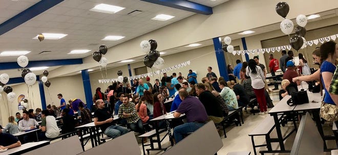 Students, faculty, parents, and alumni gathered at EA to celebrate the career of band director Patti Roussel