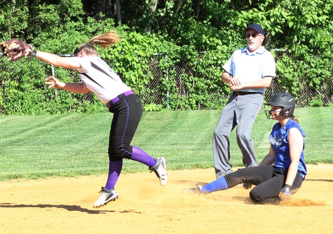 Kara Shelmire of Bedford steal second during a softball matchup with visiting Shawsheen Tech on May 29. Bedford lost to a late Shawsheen rally, 10-9. [Wicked Local Staff Photo/Martin Renzhofer]