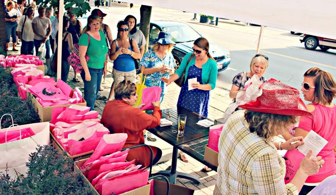 Women of all ages lined up last year to get their Passports to Pampering, just part of the fun offering during the annual Main Street Wooster Ladies' Night Out, which is scheduled for June 7 this year.