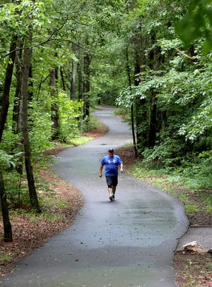 Pete Cobb enjoys a morning on the Kings Mountain Gateway Trail on Wednesday. [Brittany Randolph/The Star]