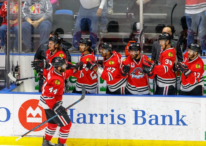 Cody Franson is congratulated by the IceHogs' bench ater he scored a goal during the team's playoff run. The Hogs made it to the AHL's Western Conference Finals. [ICEHOGS PHOTO]