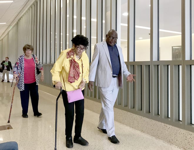 Richmond County Democratic Committee officials Jean Embry, left, and L.C. Myles enter an Augusta courtroom Friday. [SUSAN MCCORD/THE AUGUSTA CHRONICLE]