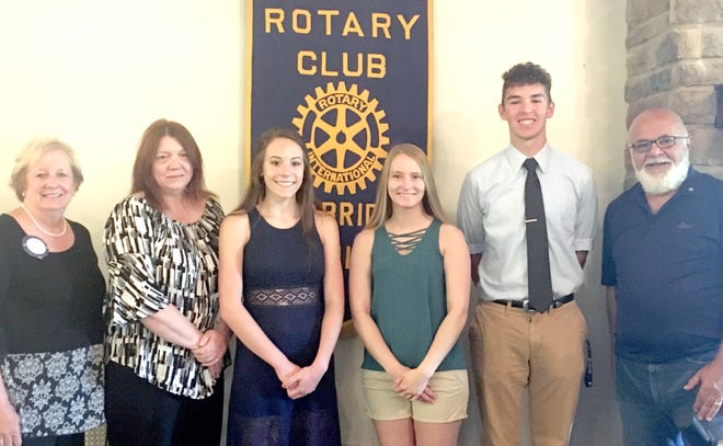 The Cambridge Rotary Club Scholarship Foundation updated Rotarians regarding the 2018 scholarship recipients during a recent club assembly. Pictured are, l to r, Rotary President Jo Sexton; Theresa White of the Scholarship Foundation; recipients Miranda Marsinek, Kami Carleton and Tyler Walker; and Gary Mbiad of the Scholarship Foundation.