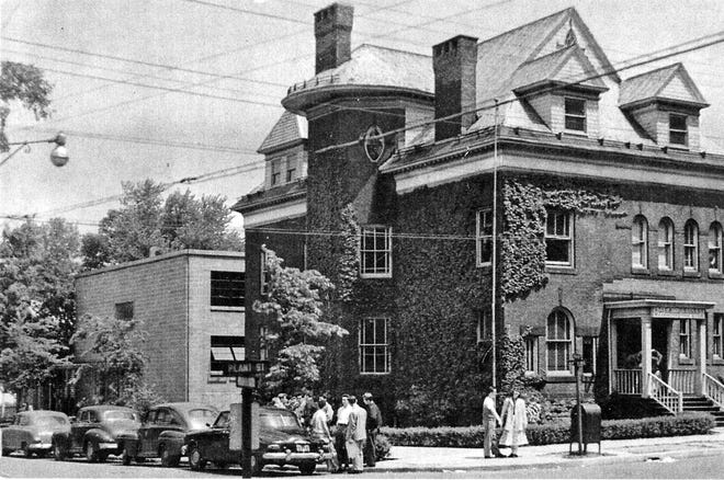 In 1961, Utica College marked its 15th anniversary by moving to its new campus on Burrstone Road. Its home during its first 15 years was the Oneida Square area. This photo shows the ivy-covered, always busy Administration Building on the northeast corner of Plant and Hart streets. Classes took place in the church house at Plymouth church, an old school building on Francis Street, a little theater on Tracy Street in a new building called College Hall, and in Pre-Fab, a government prefabricated building on Hart Street. [OBSERVER-DISPATCH FILE PHOTO]