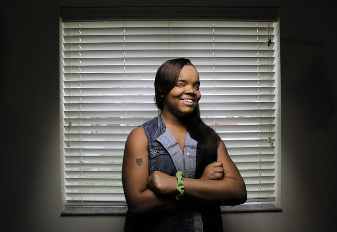 Remarkable Senior Brittany Grady, who lost her vision about 10 years ago, graduated from Atlantic Coast High School in May after dropping out of school three times. [Bob Self/Florida Times-Union]
