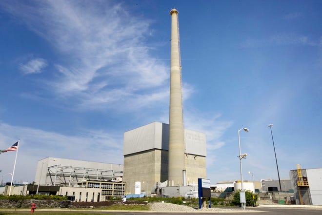 FILE – This 2010 file photo shows Exelon Corp.'s Oyster Creek Generating Station, a nuclear power plant in Lacey Township, N.J. Shutting down the site of the nation's oldest nuclear power plant will take 60 years and cost $1.4 billion, according to a plan filed May 21, 2018, by a subsidiary of Chicago-based Exelon Corp. and under review by the Nuclear Regulatory Commission. (Peter Ackerman/The Asbury Park Press via AP, File)
