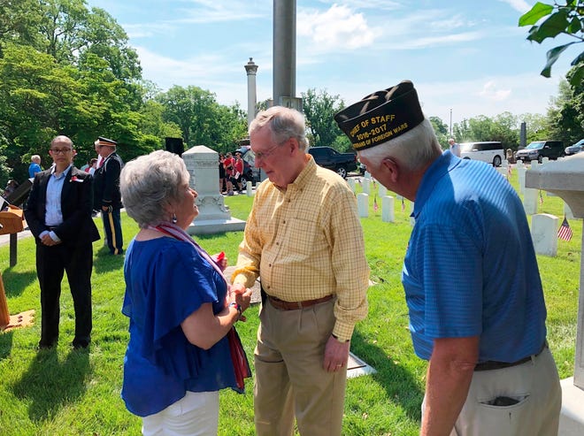 Senate Majority Leader Mitch McConnell meets with people who attended a Memorial Day service in Louisville, Ky., Monday, May 28, 2018. McConnell was the featured speaker. (AP Photo/Bruce Schreiner)