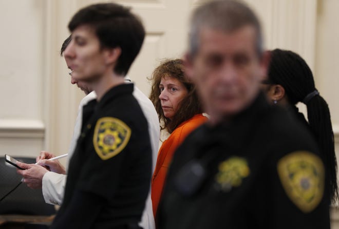 Carol Sharrow, of Sanford, Maine, stands for her arraignment on manslaughter charges at the York County Superior Court in Alfred, Maine, Monday, June 4, 2018. Sharrow is accused of driving onto the field during a baseball game in Sanford, killing Douglas Parkhurst, a West Newfield, Maine, on Friday, June 1, 2018. [AP Photo/Robert F. Bukaty]