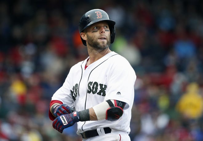 Boston Red Sox infielder Dustin Pedroia, shown walking to the dugout during a game against the Atlanta Braves last month, will be in New York on Tuesday getting the injury to his left knee re-evaluated. [Photo by AP]