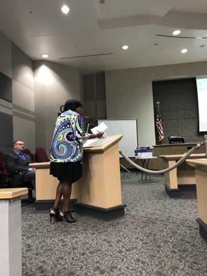 A speaker expresses her concerns about a proposed visitation rule change at a public hearing on Thursday hosted by the Florida Department of Corrections in Tallahassee. [Ben Conarck / GateHouse Media]