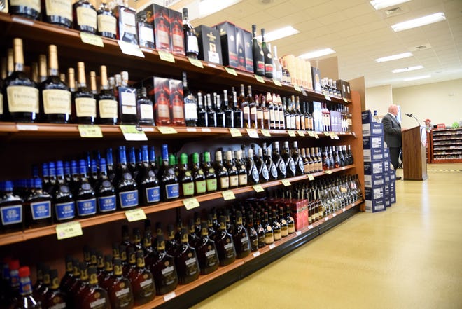 The bulk sale of booze from a New Hampshire liquor store is the source of a dispute involving a fired worker. [John Huff/Fosters.com, file]
