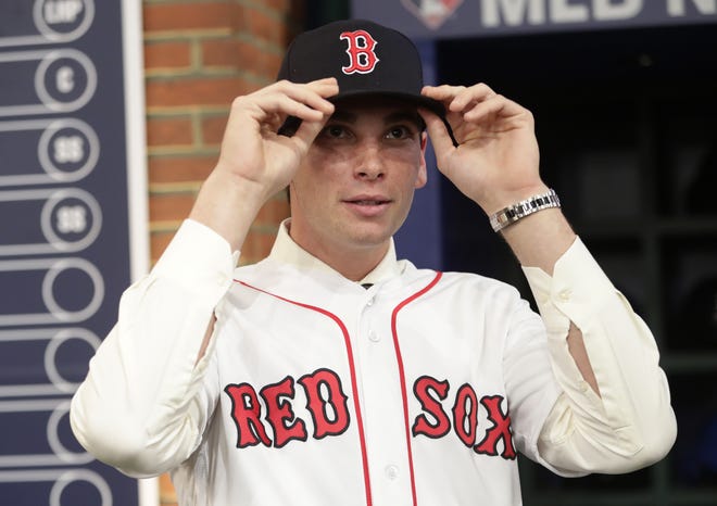 Triston Casas, a first baseman from American Heritage School in Florida, reacts after being selected 26th by the Boston Red Sox during the first round of the Major League Baseball draft Monday in Secaucus, N.J. [Frank Franklin II/AP]