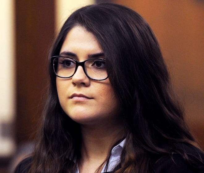 FILE - In this March 3, 2017 file photo, Nikki Yovino is arraigned in Superior Court, in Bridgeport, Conn. Jury selection in the case of Yovino is scheduled to begin Tuesday, June 5, 2018 in Bridgeport Superior Court in Connecticut. Yovino is accused of making up rape allegations against two college football players to gain the sympathy of another student she wanted to date. (Ned Gerard/Hearst Connecticut Media via AP, Pool)