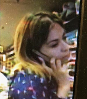 Evesham police are searching for three people suspected of stealing a wallet from a woman's purse at Redstone Grill on Route 73. [COURTESY OF EVESHAM POLICE DEPARTMENT]