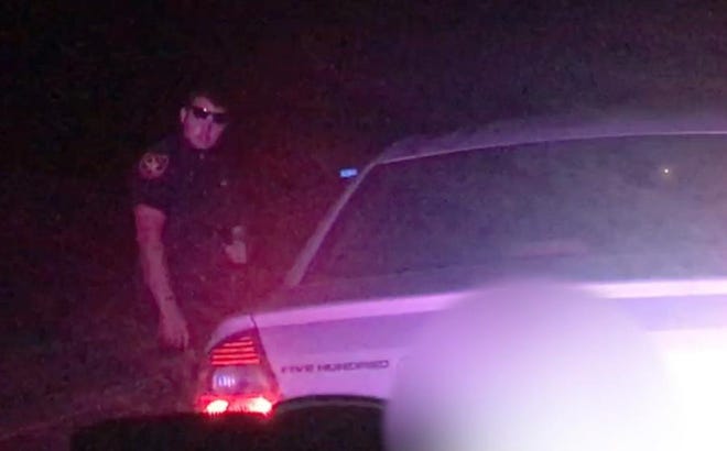 In this still from a cellphone video, Marion County sheriff's officials say Isael Ibrain Lima, 18, is conducting a traffic stop while impersonating a sheriff's deputy. Lima was wearing sunglasses, which he repeatedly adjusted during the traffic stop. [From video courtesy of MCSO]