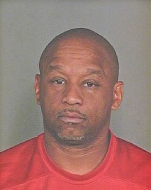 This undated booking photo provided by the Scottsdale Police Department shows Dwight Lamon Jones, who police say is responsible for killing six people in metro Phoenix over a three-day period. Jones, 56, shot himself to death as police were closing in on him Monday, June 4, 2018, at a Scottsdale, Ariz., hotel. Three of the victims were connected to Jones' divorce. He was arrested in 2009 for domestic abuse. (Scottsdale Police Department via AP)