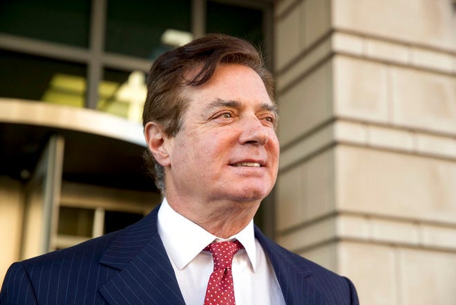 In this Nov. 2, 2017, file photo, Paul Manafort, President Donald Trump's former campaign chairman, leaves Federal District Court in Washington. Prosecutors working for special counsel Robert Mueller are accusing former Trump campaign chairman Paul Manafort of making several attempts to tamper with witnesses in his ongoing criminal cases. Mueller's team says in a new court filing that Manafort and one of his associates made several attempts to contact two witnesses in an effort to influence their testimony while he was on house arrest earlier this year. (AP Photo/Andrew Harnik, File)