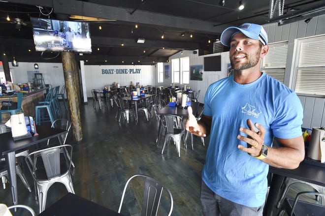 Lee Pardue, director of operations for Dock on the Island, talks about the recently opened restaurant on Okaloosa Island. The restaurant, which is located in the old Fudpucker's building, faces Choctawhatchee Bay and has dock space for diners to come by boat as well as car.

[DEVON RAVINE/DAILY NEWS]