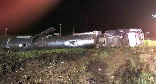 A milk tanker registered to Mountain Milk, of North Haverhill, New Hampshire, crashed Monday on Interstate 93 in Tilton, spilling thousands of gallons of milk. [NH State Police photo]