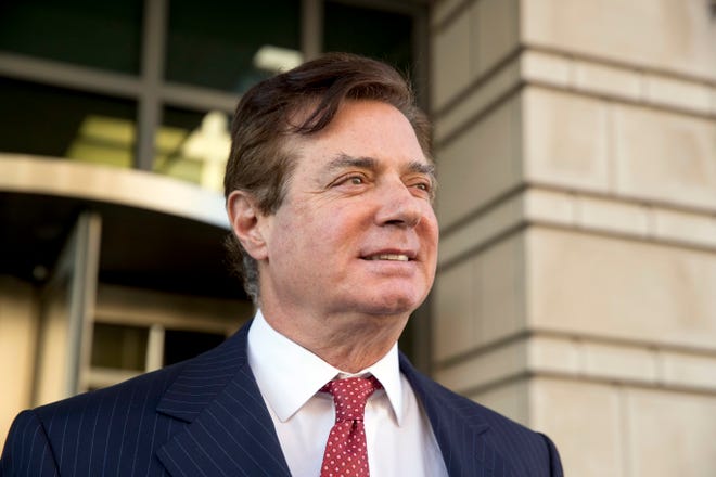 FILE - In this Thursday, Nov. 2, 2017, file photo, Paul Manafort, President Donald Trump's former campaign chairman, leaves Federal District Court, in Washington. Prosecutors working for special counsel Robert Mueller are accusing former Trump campaign chairman Paul Manafort of making several attempts to tamper with witnesses in his ongoing criminal cases. Mueller’s team says in a new court filing that Manafort and one of his associates made several attempts to contact two witnesses in an effort to influence their testimony while he was on house arrest earlier this year. (AP Photo/Andrew Harnik, File)