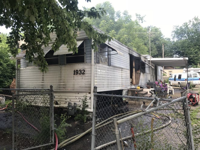 The Topeka Fire Department is investigating the cause of a house fire Monday in the 1932 S.E. Maryland Avenue. [Peyton Krause/The Capital-Journal]