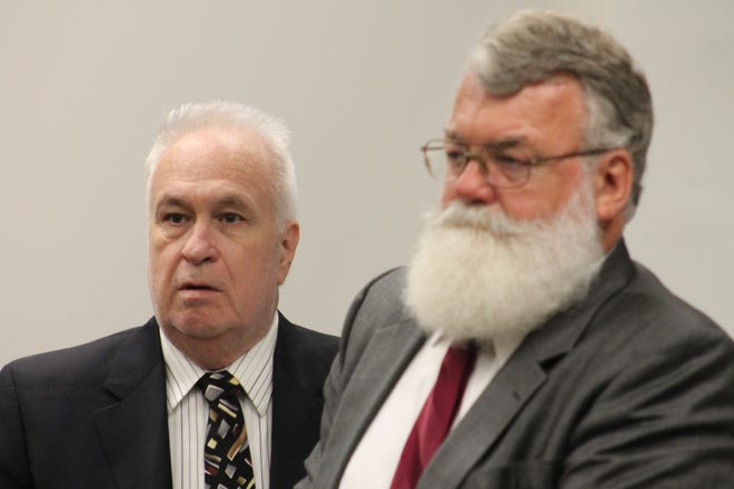 Andrew Pace, left, stands with his attorney, Stan Peacock, during Pace's rape trial in Panama City. [ZACK McDONALD/THE NEWS HERALD]