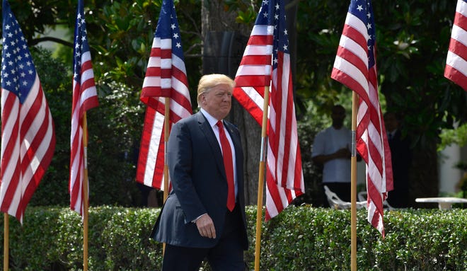 President Donald Trump arrives for a "Celebration of America" event at the White House, Tuesday, June 5, 2018, in Washington, in lieu of a Super Bowl celebration for the NFL's Philadelphia Eagles that he canceled. [AP Photo/Susan Walsh]