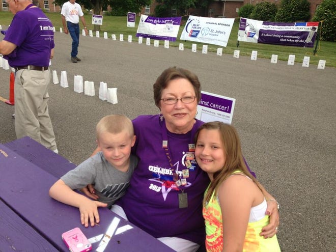 In a photo from 2013 Charlotte Bennett is with her grandchildren at the Relay for Life of Logan County event. [Photo courtesy of Lesleigh Bennett]