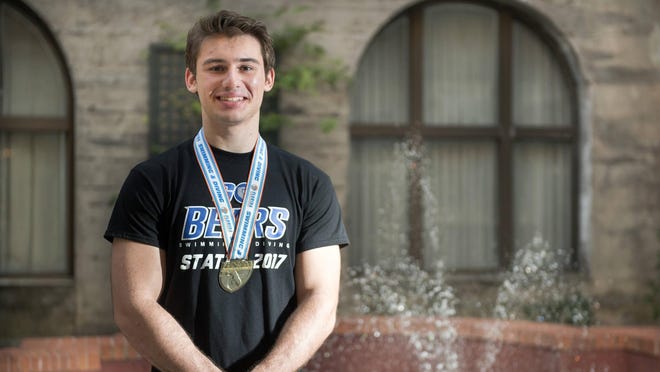 Bartram Trail senior Nathan Howze won the Class 3A diving championship in November with 433.3 points. “Diving is mainly mental,” he told The Record. “You have to have courage to dive from 33 feet. I’ve hit the board plenty of times and I have plenty of scars." [CHRISTINA KELSO/THE RECORD]