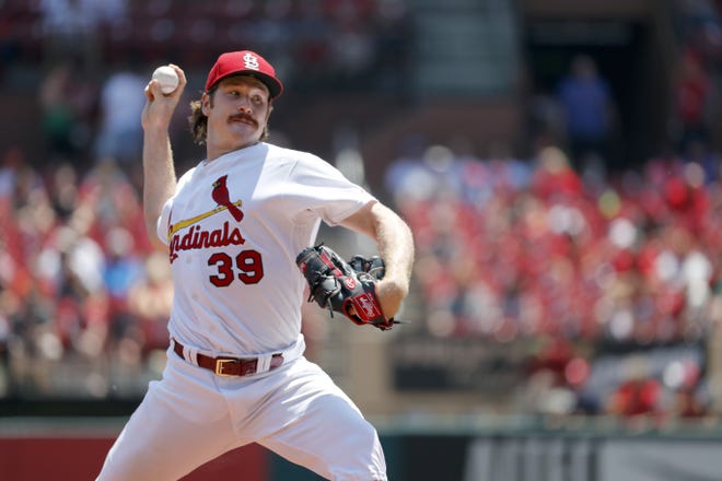 St. Louis Cardinals starting pitcher Miles Mikolas throws during the first inning against the Miami Marlins on Thursday in St. Louis. Mikolas allowed an unearned run in seven innings to lead St. Louis past the Marlins 4-1. [Jeff Roberson/The Associated Press]