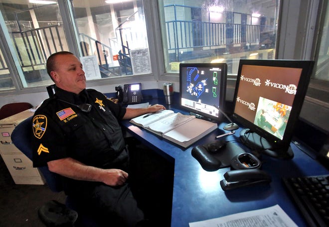 Cpl. Wesley Costner monitors pods at the Cleveland County Jail Annex. Under the new budget, five detention officers will be added to the force. [The Star file photo]