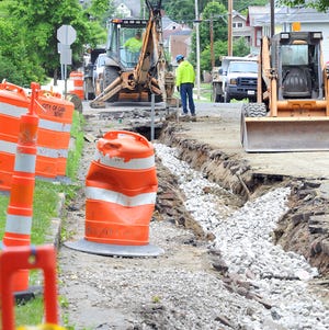 Cambridge street department and water department workers teamed up Wednesday to replace more than 200 feet of six-inch water line on Beatty Avenue.